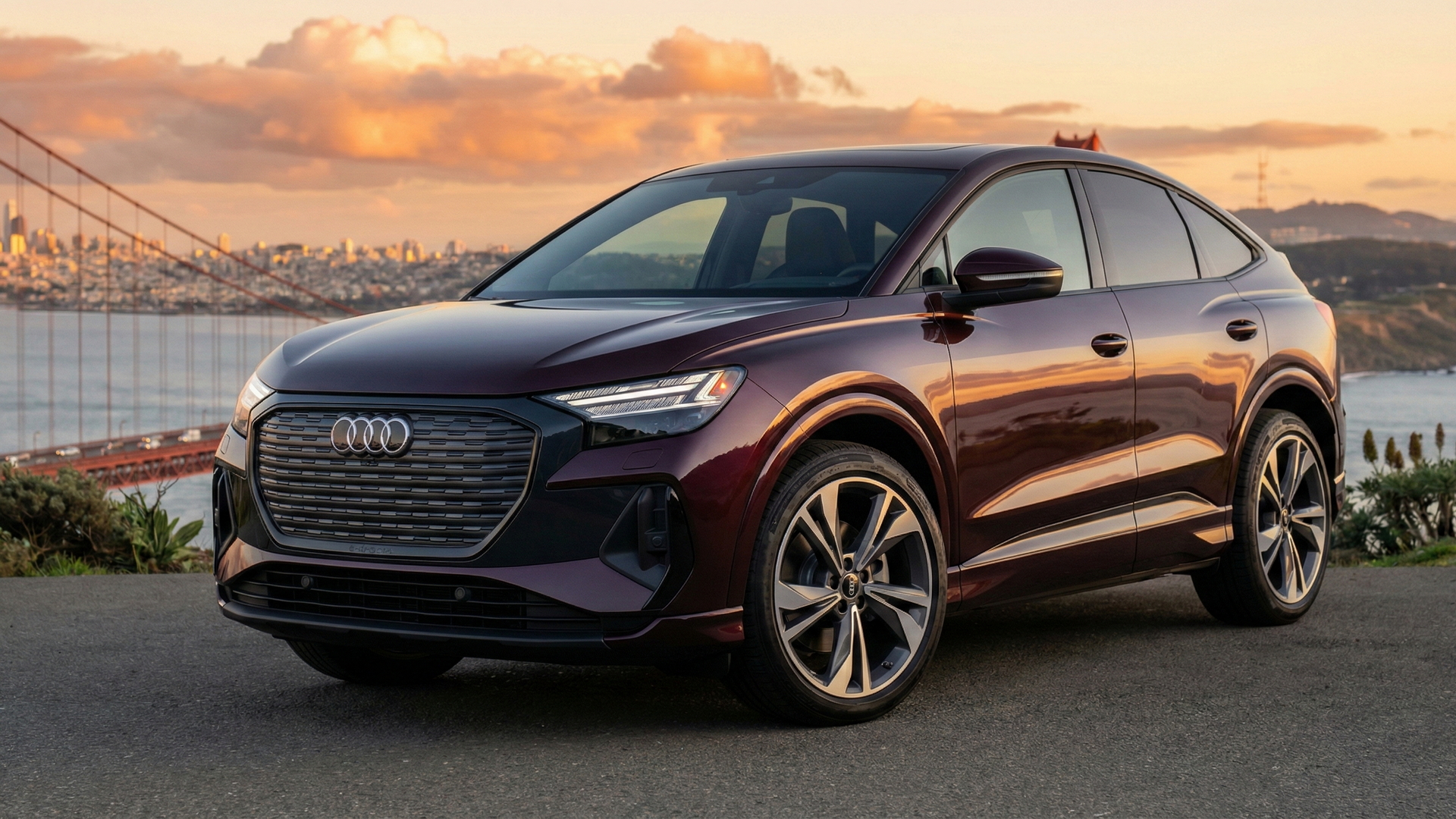 Audi Q4 Sportback e-tron parked near the Golden Gate Bridge at sunset, appealing to California drivers looking to sell their car.