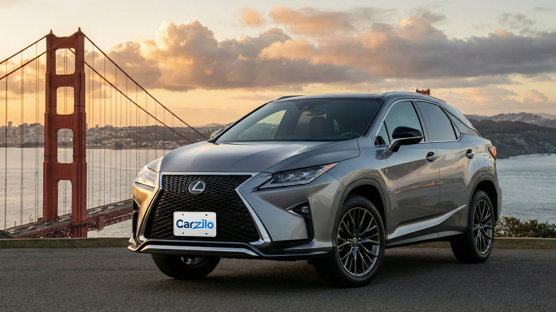 Sell Your LEXUS RX in San Francisco LEXUS RX silver SUV parked near the Golden Gate Bridge in San Francisco at sunset, highlighting an easy car selling option in California.