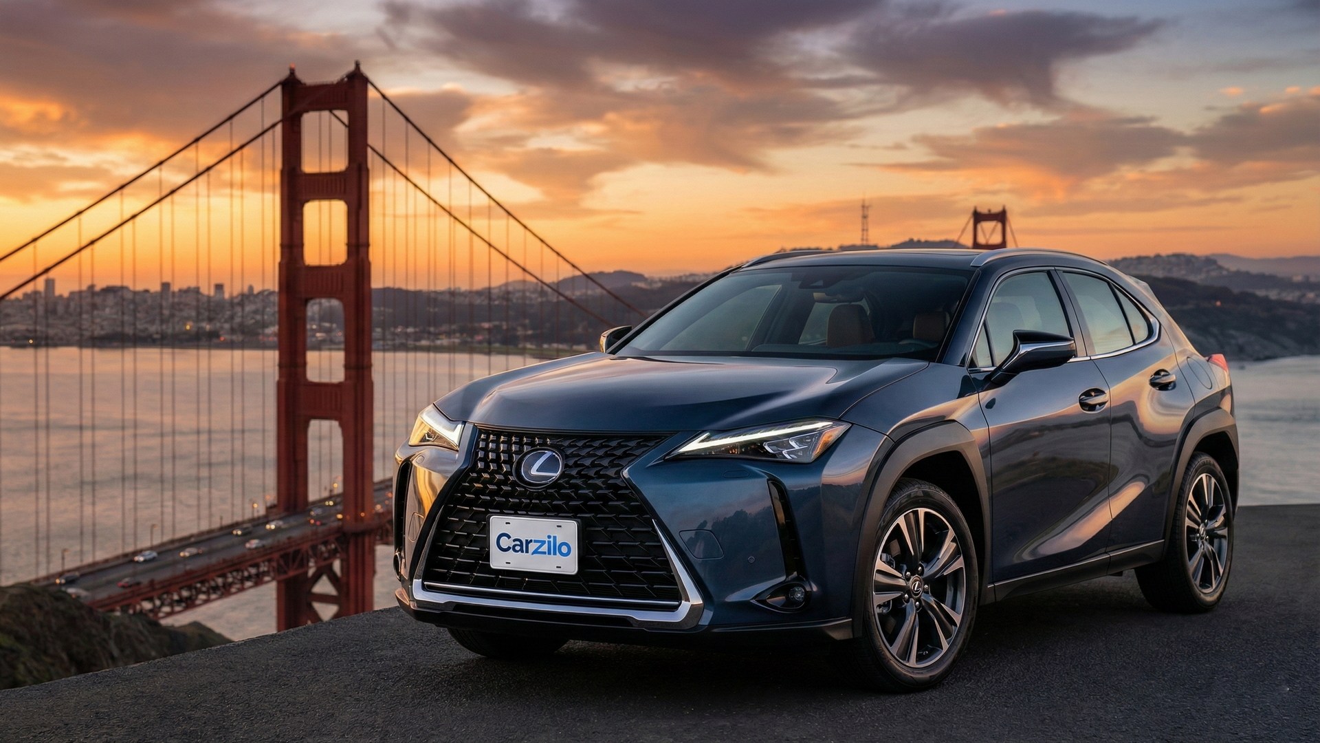 Sell Your Lexus UX in San Francisco Lexus UX blue compact SUV parked near the Golden Gate Bridge at sunset, ideal for California car sellers.