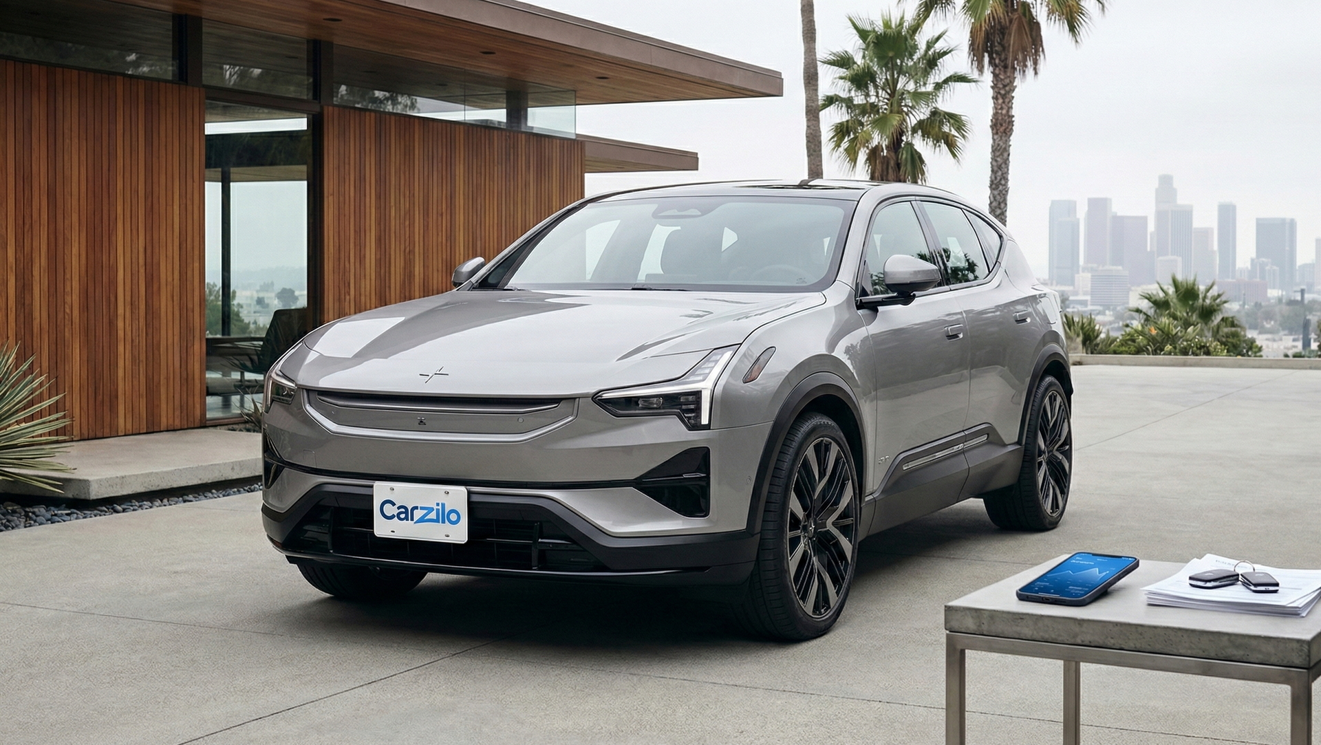 Sell Your Polestar 3 in California Polestar 3 silver electric SUV parked at a modern Los Angeles home with city skyline in the background, ready for California owners looking to sell.