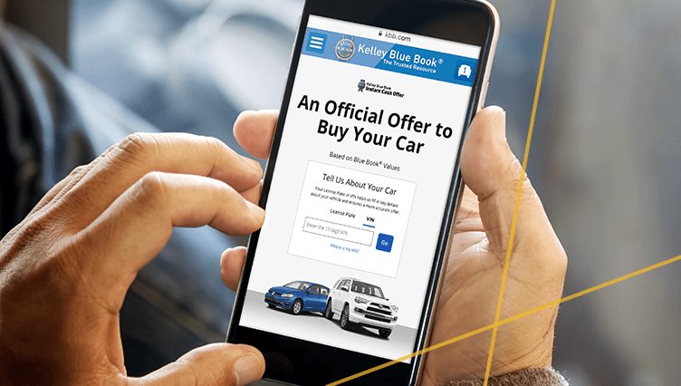 Beat My KBB Offer Online - CarZilo Vehicle Valuation A close-up of a person holding a smartphone displaying the Kelley Blue Book Instant Cash Offer screen on kbb.com, representing how CarZilo can beat my KBB offer online.